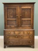 19TH CENTURY. OAK PRESS CUPBOARD with two cupboard doors over base of three opening drawers, with