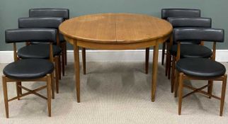G PLAN MID-CENTURY TEAK EXTENDING DINING TABLE, 73 (h) x 122/168cms (diam.), and set of six vinyl