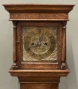 EDWARDIAN GRANDMOTHER CLOCK by 'J Griffith of Carnarvon', with brass dial, twin fusee movement and