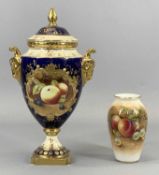 TWO VASES: Coalport lidded vase with cobalt blue ground, panel painted with fruit, signed 'M.