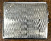 GEORGE V RECTANGULAR SILVER CIGARETTE CASE with engine turned decoration and monogrammed 'MCB',