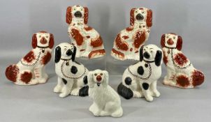 3½ PAIRS OF STAFFORDSHIRE FIGURES OF SEATED SPANIELS, 19th century and later, 25cms (h) the