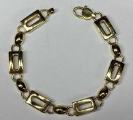 YELLOW METAL BRICK LINK BRACELET, stamped 750, 18.5mms (l), 17.8gms Provenance: deceased estate
