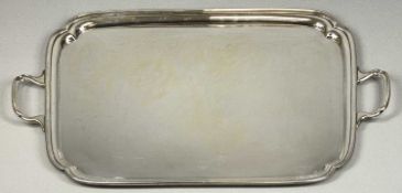 GEORGE V RECTANGULAR TWO-HANDLED TEA TRAY with beaded moulded rim and re-entrant corners, G M & S,