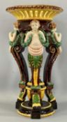 MAJOLICA JARDINIERE probably Minton, with pierced top, figural triple supports modelled as putti,