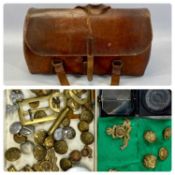 MILITARIA including assorted cap badges, uniform buttons, cartridge cases, WWII mark I magnetic