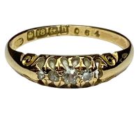 18CT GOLD RING SET WITH BAND OF FOUR SMALL DIAMONDS, size O, 2.2gms Provenance: deceased estate