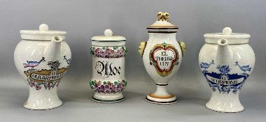 TWO ITALIAN STYLE WET DRUG JARS WITH COVERS, lettered and decorated with birds, 26cms (h) along with