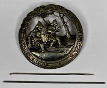 NORWEGIAN CIRCULAR SILVER SKIING BROOCH with depiction of Birkebeiner saving Haakon Haakonsson and