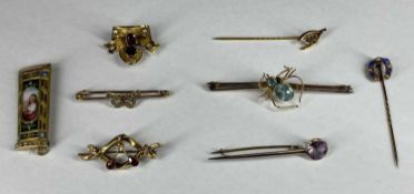 EIGHT VARIOUS STONE SET GOLD/YELLOW METAL BROOCHES & STICK PINS Provenance: private collection