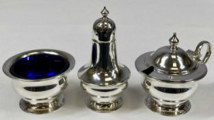 GEORGE VI SILVER CRUET SET comprising mustard, salt and pepper pot having blue glass liners,