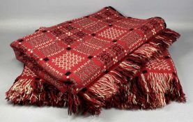 PAIR OF TREGWYNT WELSH WOOLLEN BLANKETS double sided and fringed, red, cream and black geometric