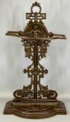 VICTORIAN STYLE CAST IRON STICK STAND, back pierced and with cherub motif, removable drip tray,