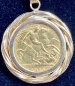 GEORGE V 1914 GOLD HALF SOVEREIGN mounted as a pendant with 9ct gold chain, 24.6gms gross