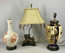 THREE TABLE LAMPS comprising composite Foo Dog on rectangular plinth having fabric shade with