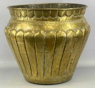 LARGE CIRCULAR EASTERN BRASS JARDINIÈRE having embossed and chased decoration, 49 (h) x 52cms (