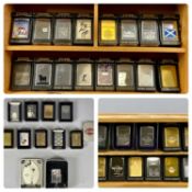 COLLECTION OF BADGED ZIPPO LIGHTERS, approx. 36, with boxes/cases Provenance: deceased estate Conwy
