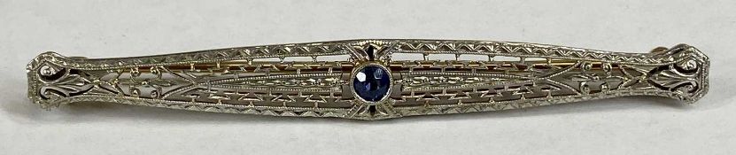 ART DECO WHITE & YELLOW GOLD FILIGREE BAR BROOCH, set with blue round cut sapphire, stamped 14k,