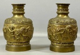 PAIR OF FRENCH GILDED BRONZE CANDLE HOLDERS, late 19th century, bodies cast with putti and bands