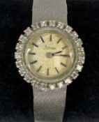 PRIMATO 14CT WHITE GOLD LADIES' BRACELET WATCH, circular case with diamond set bezel, champagne dial