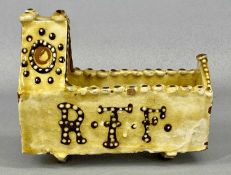 THOMAS TOFT STYLE STUDIO POTTERY SLIPWARE MINIATURE COT, 20th century, tube lined decoration