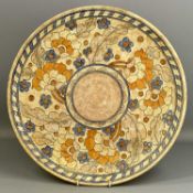 CROWN DUCAL CIRCULAR CHARGER BY CHARLOTTE RHEAD, tube lined decoration in 'Byzantine' pattern,