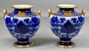 PAIR OF JAMES MACINTYRE AURELIAN WARE TWO-HANDLED VASES, designed by William Moorcroft c. 1900,