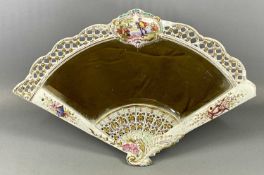 CONTINENTAL PORCELAIN FRAMED FAN SHAPED DRESSING TABLE MIRROR having a central panel painted with