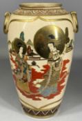 JAPANESE SHŌ KANNON BALUSTER VASE decorated with figures and flowers, and with fixed ring side