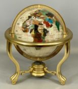 HARDSTONE TERRESTRIAL GLOBE, on gilt metal gimbal stand, base set with a compass, 36cms (h)