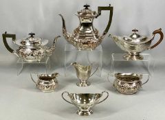 EPNS THREE PIECE TEA SERVICE of oval form, patent teapot engraved with ribbons and swags, and