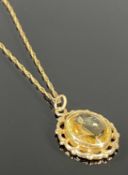 9CT GOLD PENDANT & CHAIN, oval gold mounted drop set with citrine stone, 3.4gms gross Provenance: