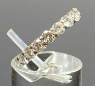 18CT WHITE GOLD FULL HOOP ETERNITY RING, set with 19 brilliant cut claw set diamonds, size K, 3.7gms