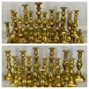 LARGE ASSORTMENT OF VICTORIAN BRASS CANDLESTICKS, approx. 20 pairs Provenance: private collection