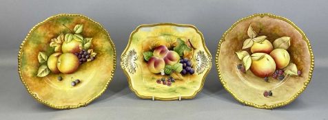 TWO COALPORT PLATES, hand painted with apples and blackberries, and with gilded rims, signed '