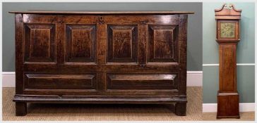 LATE 17TH CENTURY JOINED OAK COFFER, hinged two-plank top above fielded panelled front and side,