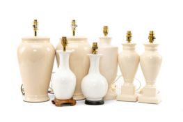ASSORTED WHITE/CREAM GLAZED TABLE LAMPS including two pairs, largest 34cms (h) to shoulder (7)