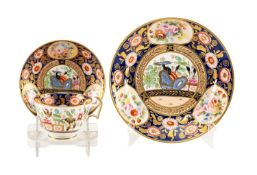 SWANSEA PORCELAIN TRIO circa 1815-17, richly decorated with set pattern '219' of panels of