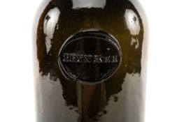 MID-19TH CENTURY BLACK GLASS WINE BOTTLE with seal ‘Brynker’ (historic estate near Porthmadog) 30cms