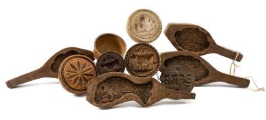 COLLECTION OF KITCHEN TREEN, including butter presses, biscuit moulds, boxwood and fruitwood etc.