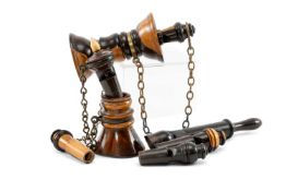 GOOD GROUP OF MARINE WHISTLES, comprising double bridge tube whistle with brass chain mounts, single