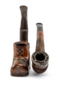 TWO NOVELTY TOBACCO PIPES including horse's foot with metal horseshoe, boot and African gentleman (