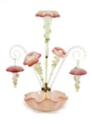 VICTORIAN GLASS EPERGNE, the handkerchief base supporting two twisted canes with baskets, and