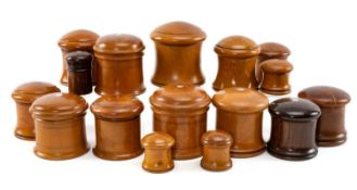 COLLECTION OF PHARMACY TREEN, boxwood and other powder jars with domed lids, screw or bayonet