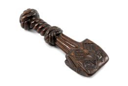 FINE CARVED MAHOGANY SEAM RUBBER, possibly Welsh, handle carved as plaited/knotted ropework, above