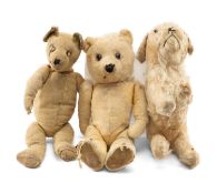 THREE VINTAGE SOFT TOYS, including 2 small jointed teddy bears and a dog, all with play worn