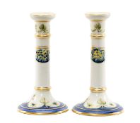 WILLIAM MOORCROFT FOR JAMES MACINTYRE & CO: PAIR OF FLORIAN CANDLESTICKS, painted in blue, yellow