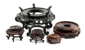 FIVE ASSORTED CHINESE HARDWOOD BOWL/VASE STANDS Provenance: private collection Cardiff