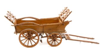 MODEL TREEN TRUMBLE CART, with metal rimmed wagon wheels, 50cms (l) excluding harness Provenance: