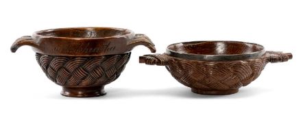 TWO MINIATURE CELTIC QUAICHS, one with engraved Irish inscription to rim, the other with silver-